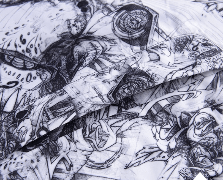 Close-up of black and white abstract graphic design on a men's ski jacket.